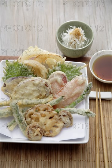 Battered vegetables on plate