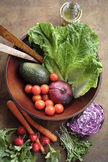 Fresh vegetables in wooden bowl