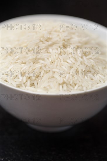 Uncooked rice in bowl