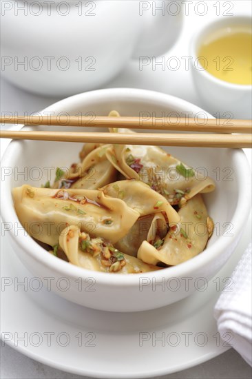 Asian dumplings in bowl