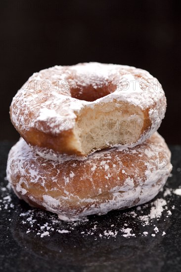 Close up of powdered donuts