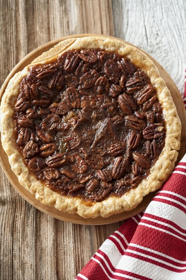 Pecan pie on tablecloth