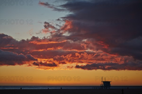 Clouds illuminated in colorful sunset sky