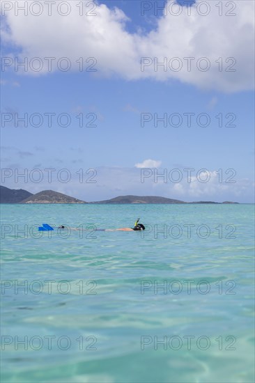 Caucasian man snorkeling in tropical ocean