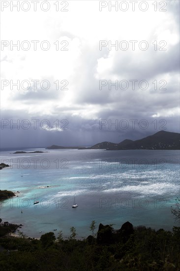 Aerial view of ocean and lush coastline