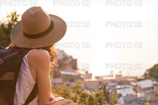 Caucasian woman enjoying scenic view of Manarola