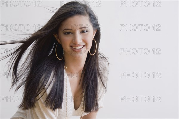 Smiling mixed race woman