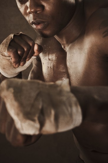 African American boxer training