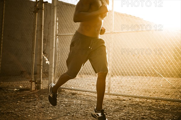 African American man jogging