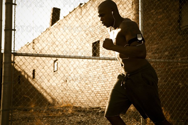 African American man jogging