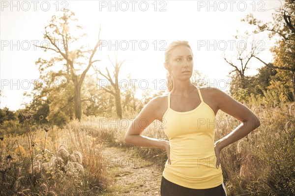 Caucasian woman standing on path