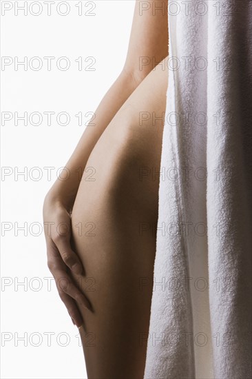 Caucasian woman's bare hip