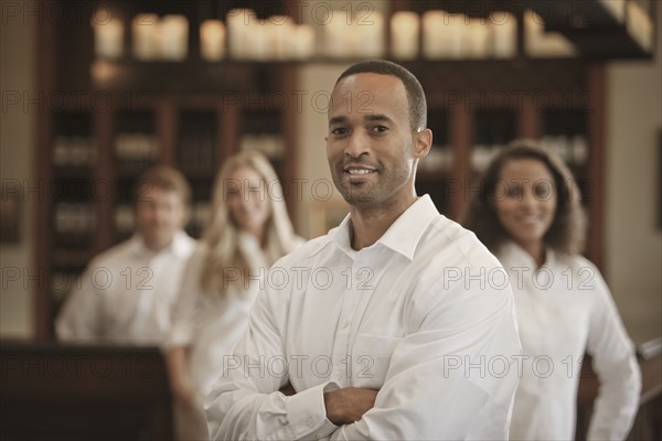 Wait staff standing in restaurant