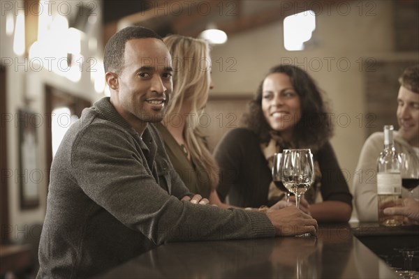 Friends drinking wine together