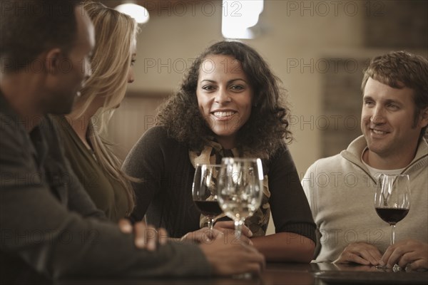 Friends drinking wine together