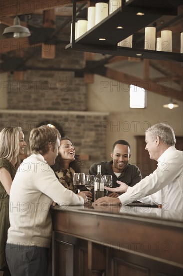 Friends drinking wine together