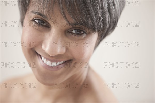 Smiling mixed race woman