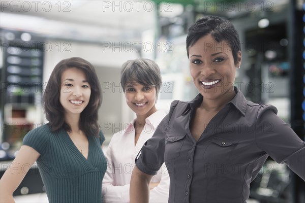 Businesswomen standing in server room