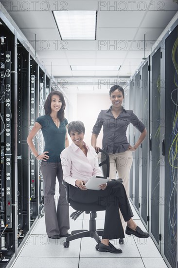 Businesswomen in server room