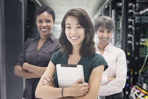 Businesswomen standing in server room