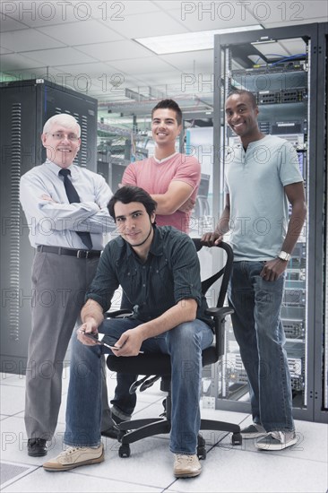 Businessmen in server room