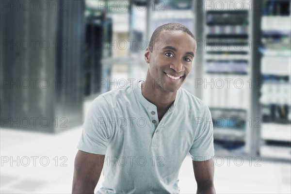 Black businessman in server room