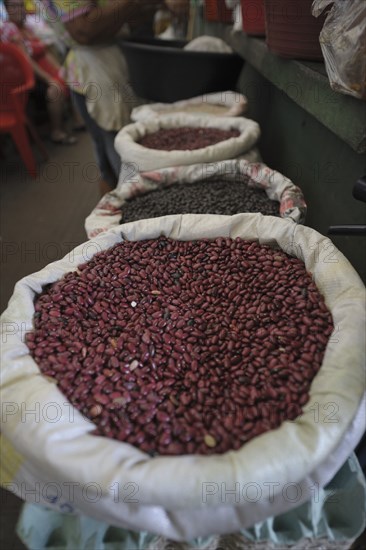 Sacks of dried beans at market