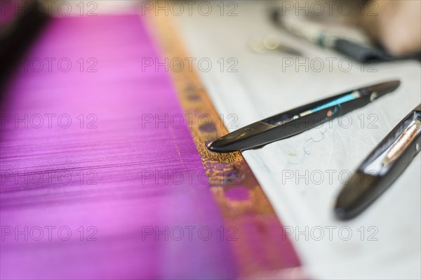 Close up of tools on loom