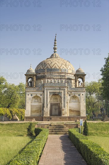 Ornate building with manicured lawn