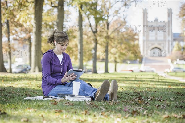 Caucasian student studying on campus