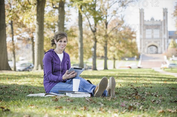 Caucasian student studying on campus