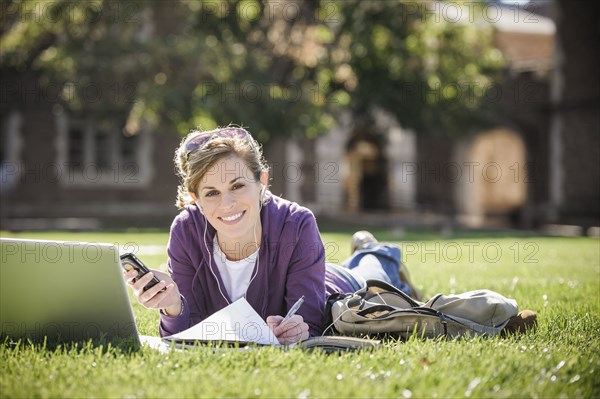 Caucasian student studying on campus