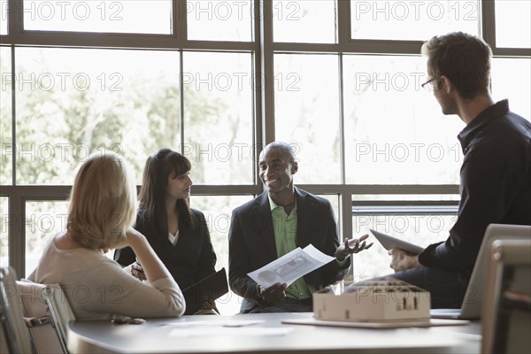 Business people talking in meeting