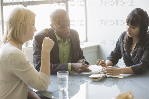 Business people talking in meeting