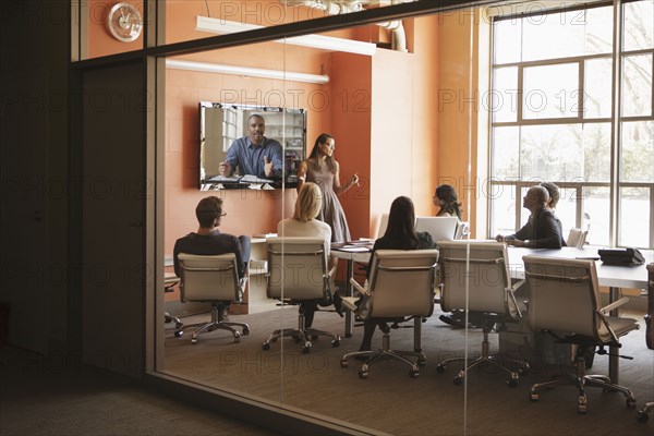 Business people having teleconference in meeting