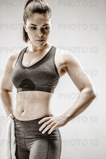 Caucasian woman resting after workout