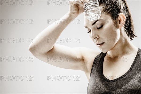 Caucasian woman resting after workout