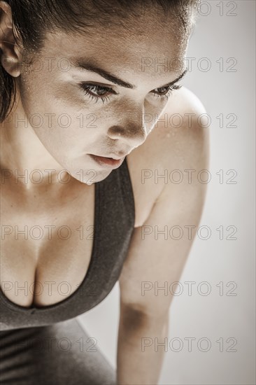 Caucasian woman resting after workout