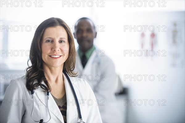 Doctors standing in office