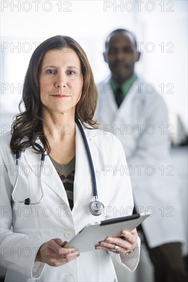 Doctors standing in office