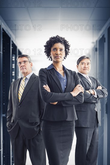 Businesspeople standing in office