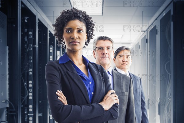 Businesspeople standing in office