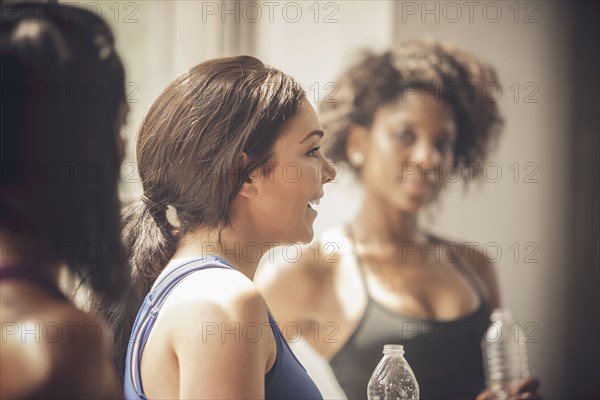 Women talking in gym