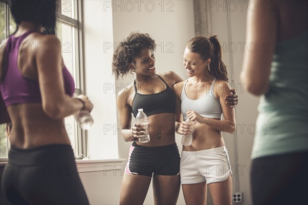 Women talking in gym