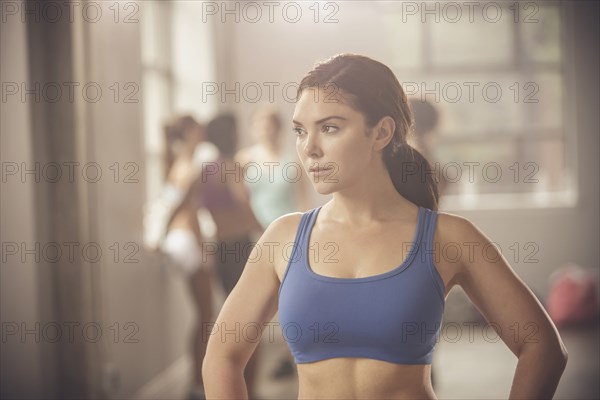 Woman standing in gym