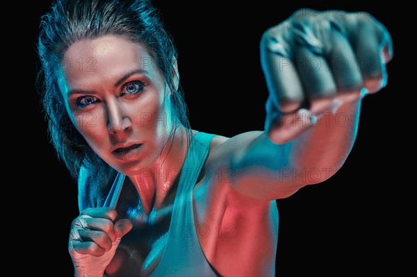 Caucasian boxer in fighting stance