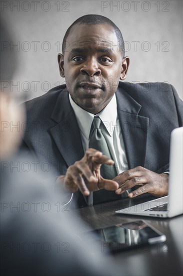 Businessman talking in meeting