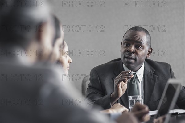 Business people talking in meeting