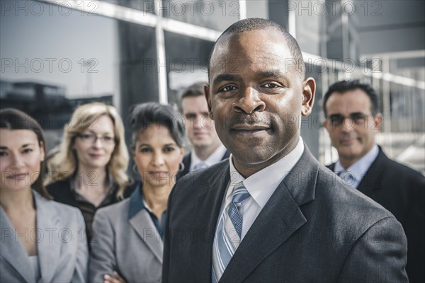 Business people smiling outdoors