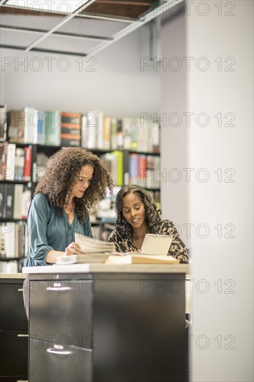 Businesswomen working together in office